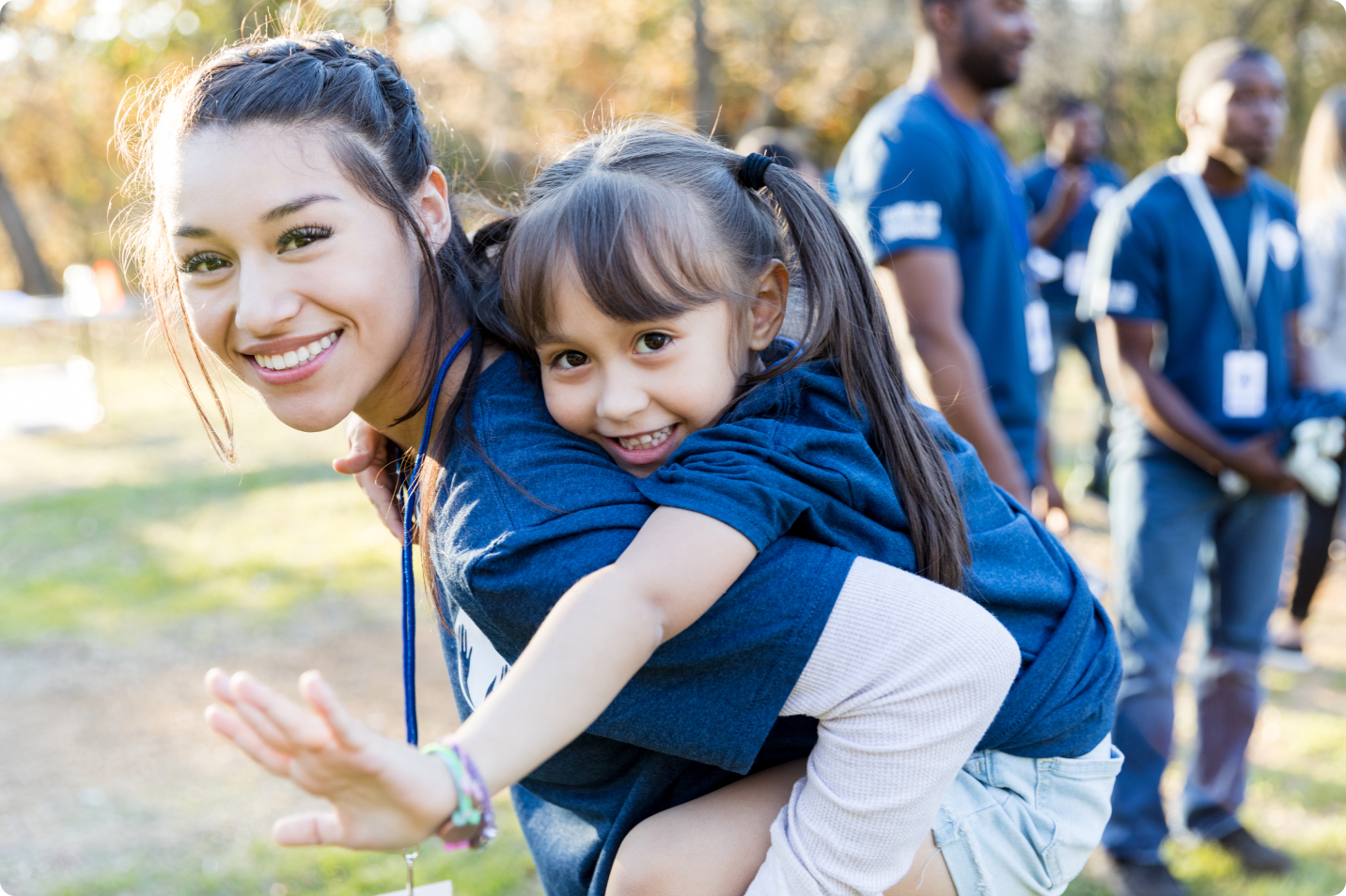 Female volunteer with little girl